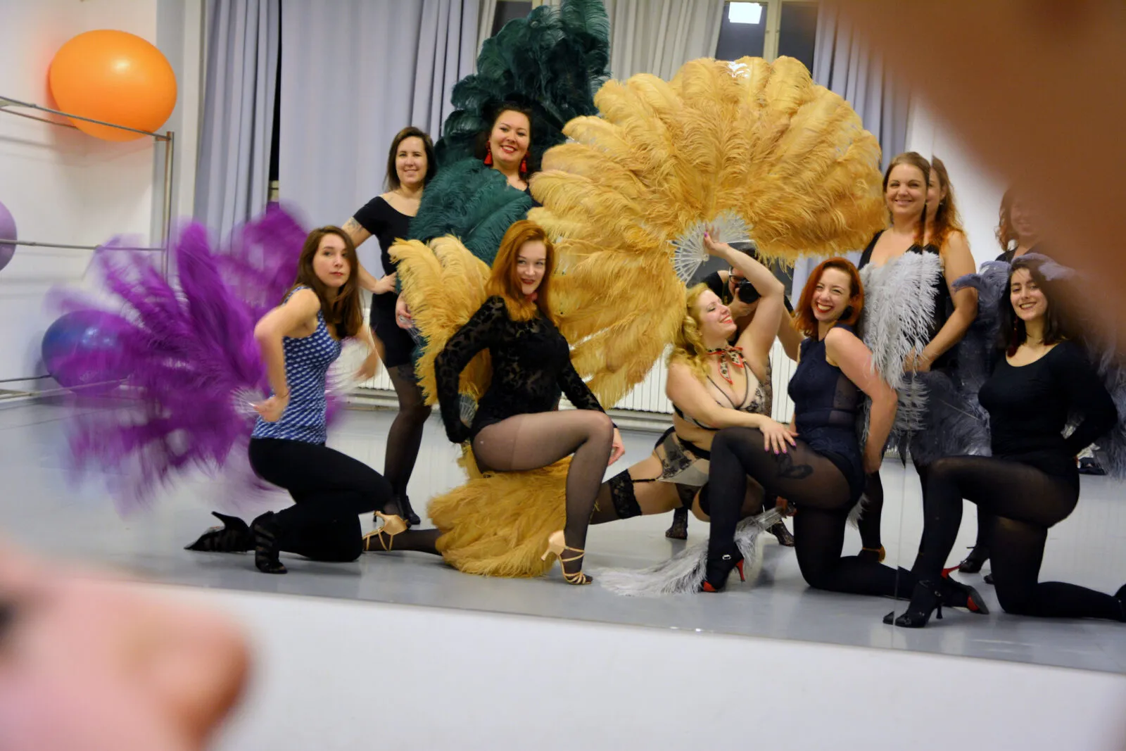 Class with feather fans